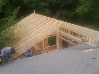 Framing a new roof addition that ties into an existing shingle roof in Ohiopyle